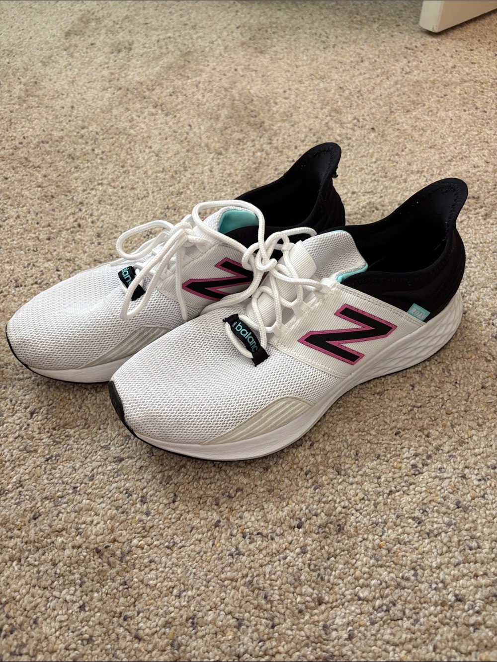 New Balance White Running Sneakers with Pink 'N' and Black Collar